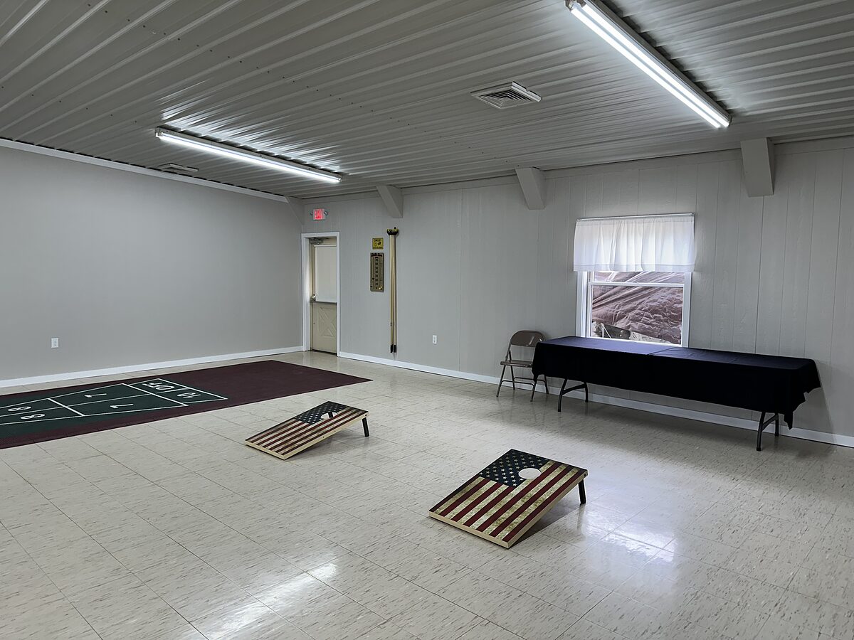 Shuffleboard and cornhole in the recreation hall